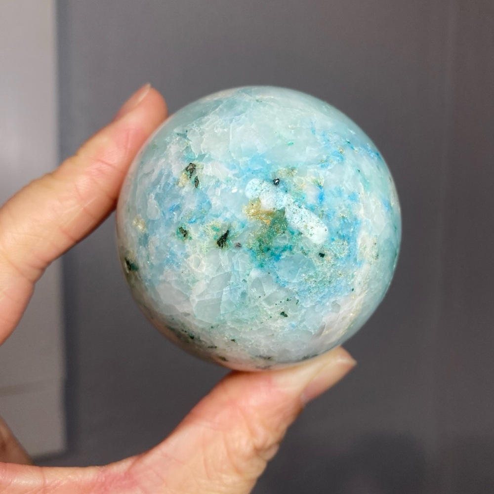 PHOENIX CRYSTAL SPHERE WITH DRUZY POCKETS